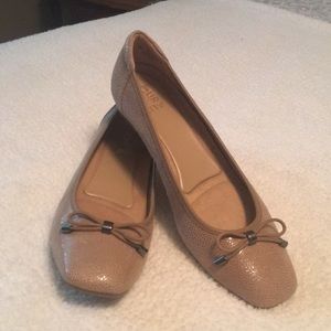 Excellent condition tan flat slight shimmer